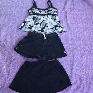 A swim suit top, swim shorts and swim skirt!